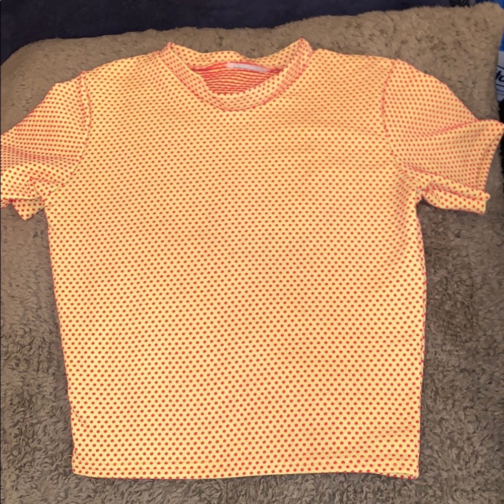bright yellow spandex top w/red dot texture